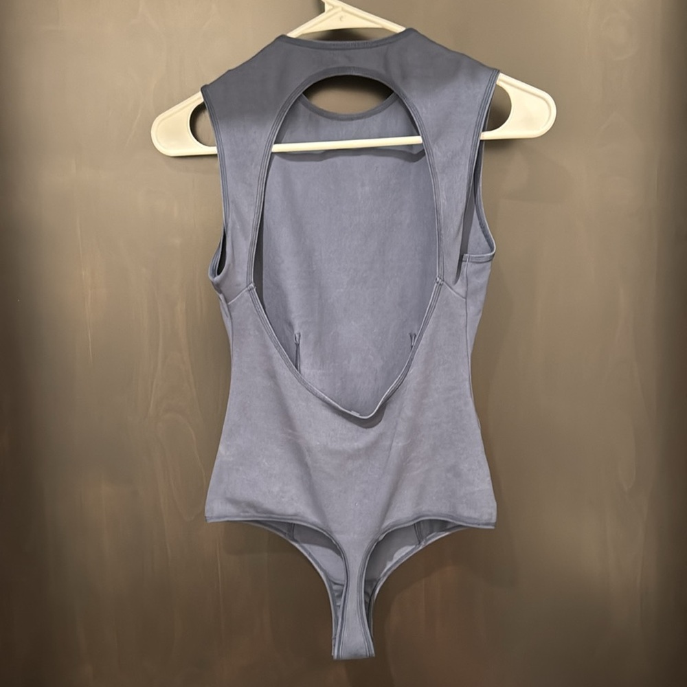 Never worn skims open back onsie